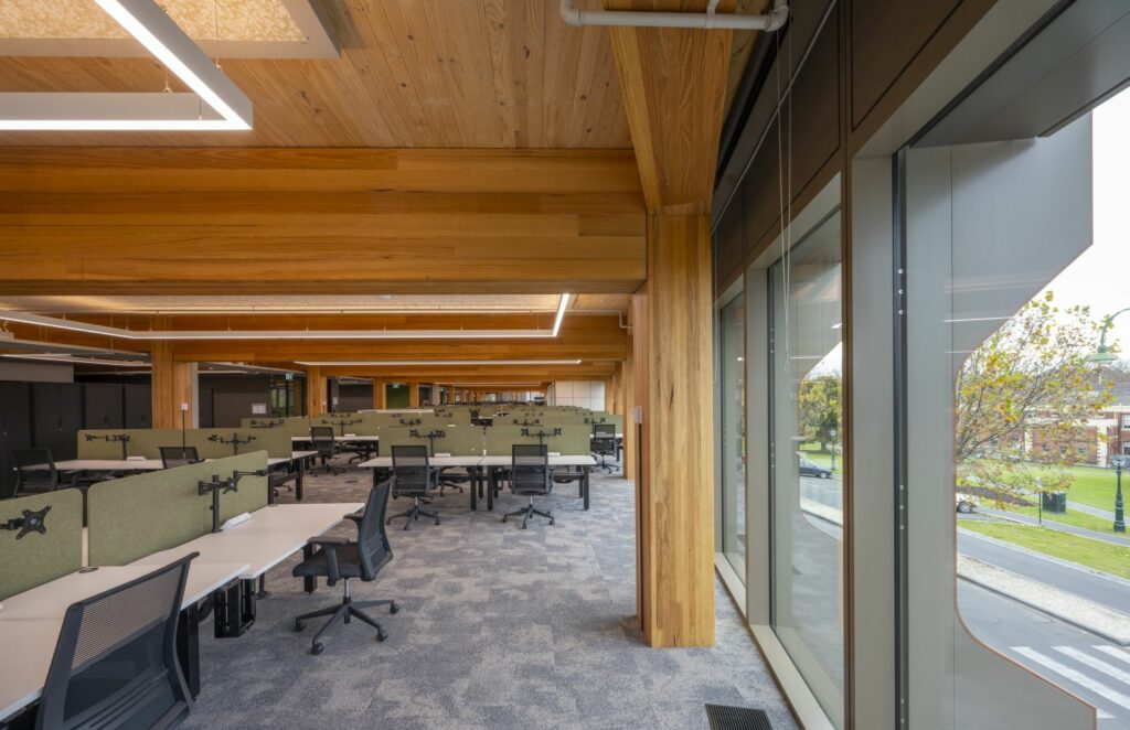 Galkangu - Bendigo GovHub featuring ASH's MASSLAM. Photo credit: Ned Meldrum Internal look at the completed Galkangu Bendigo GovHub in Victoria, featuring MASSLAM (mass timber) columns and beams.