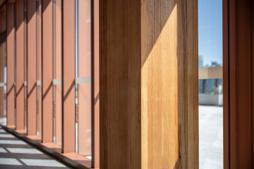 Close up view of the impressive MASSLAM glulam columns at T3 Collingwood. Image: ICON Close up view of the impressive MASSLAM (mass timber) glulam columns at T3 Collingwood commercial office tower. Image credit: ICON