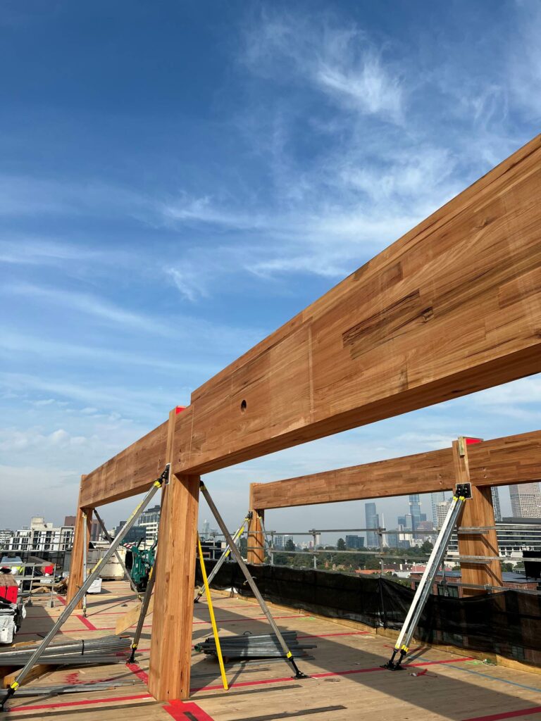 T3 Collingwood during construction featuring MASSLAM columns and beams. Image: ASH T3 Collingwood during construction featuring ASH's MASSLAM (mass timber) columns and beams. Image credit: ASH
