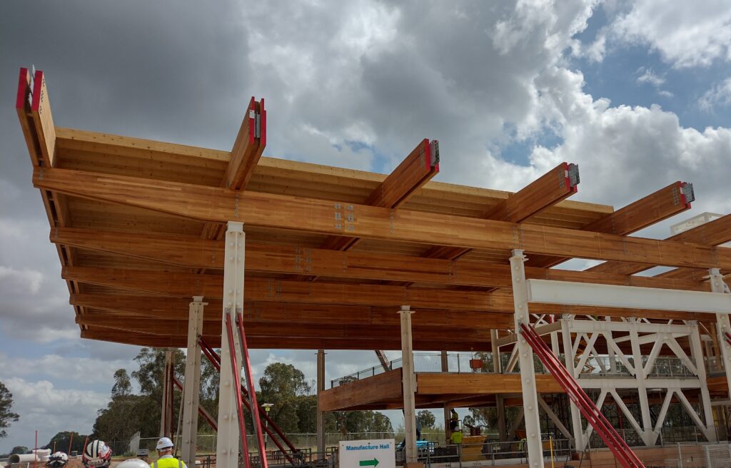 Advanced Manufacturing Readiness Facility - First Building during construction with ASH's glulam mass timber, MASSLAM. Photo: ASH