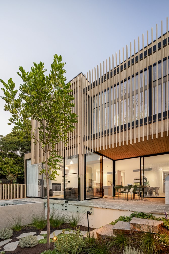 External facade of Denman Avenue by Orbis Constructions featuring ASH's IronOak hardwood timber cladding and battens.