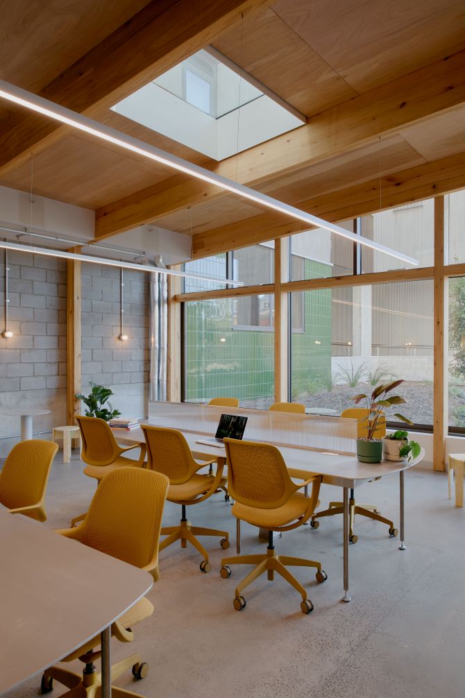 Plantation Oak MASSLAM by ASH brings function and warmth to an overlooked thoroughfare.